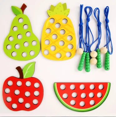 Wooden fruit threading board placed in Montessori early education threading game - KIWI UNIVERS