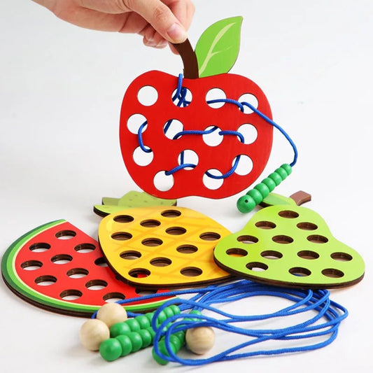 Wooden fruit threading board placed in Montessori early education threading game - KIWI UNIVERS